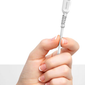 Isolated female hands holding an object